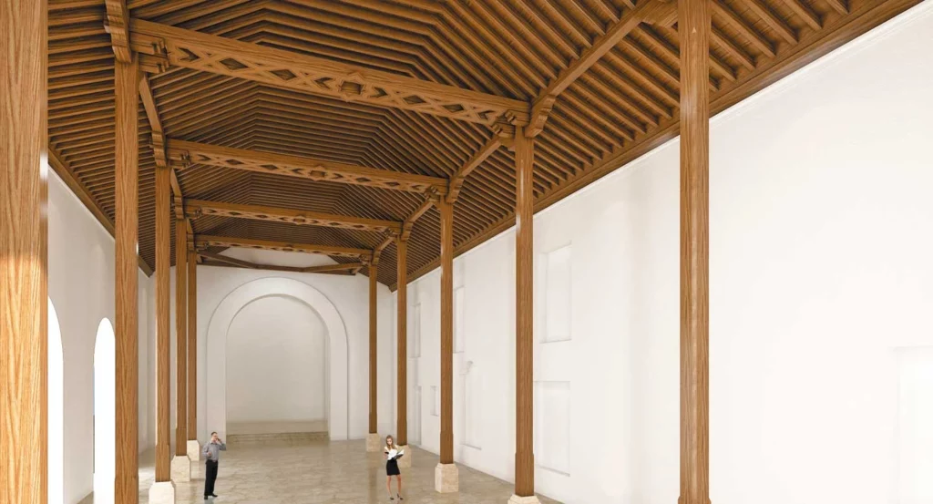 La compleja estructura de madera de un tejado colonial, construida con un arte similar al de las embarcaciones, como un barco al revés